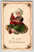 Christmas Postcard Dutch Girl Holds Doll John Winsch Back Germany Embossed 4391 - £19.92 GBP
