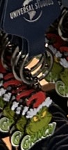 Universal Studios Dr Seuss The Grinch Wreath Keychain New - $295.62 MXN