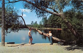 PAW PAW MICHIGAN GREETINGS FROM POSTCARD 1960s YOUNG BOY &amp; WOMAN FISHING - $6.07