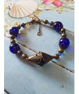 Victorian Bronze Filigree Bracelet: Royal Blue Glass Boho Jewelry - $34.00