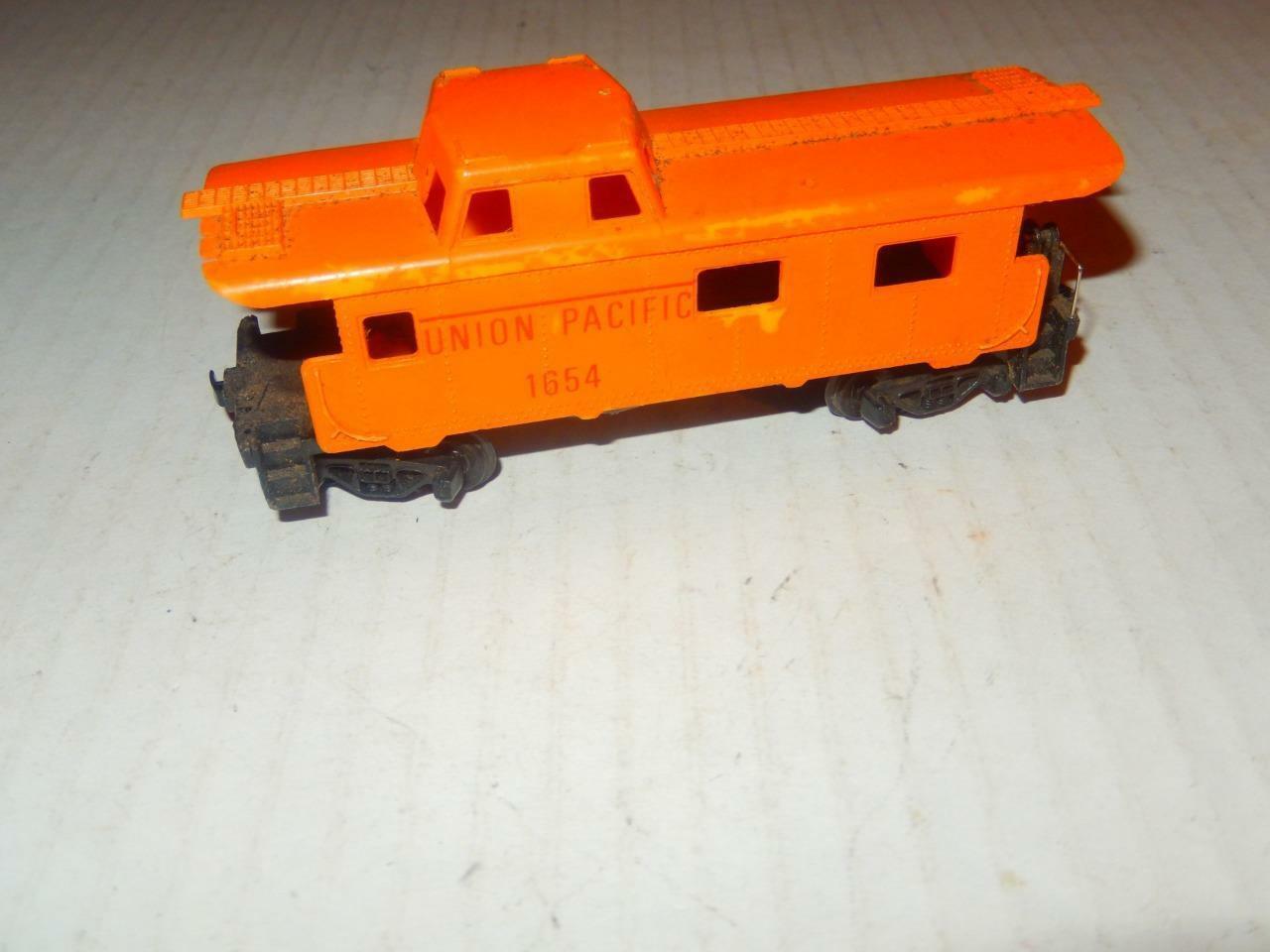Primary image for HO TRAINS- TWO UNION PACIFIC CABOOSES- (ONE TYCO)-- LATCH COUPLERS - FAIR - S1