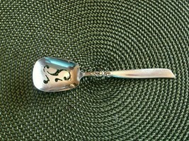 Community south seas serving spoon pierced silverplate  5-5/8" - $13.86