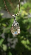 Uv reactive crystal pendant // Petroleum quartz // Terminated quartz - $31.14