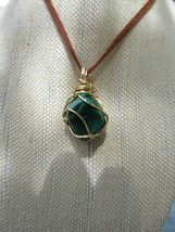 Natural tumbled Malachite wire wrapped pendant .Gold colour wire. - £20.91 GBP