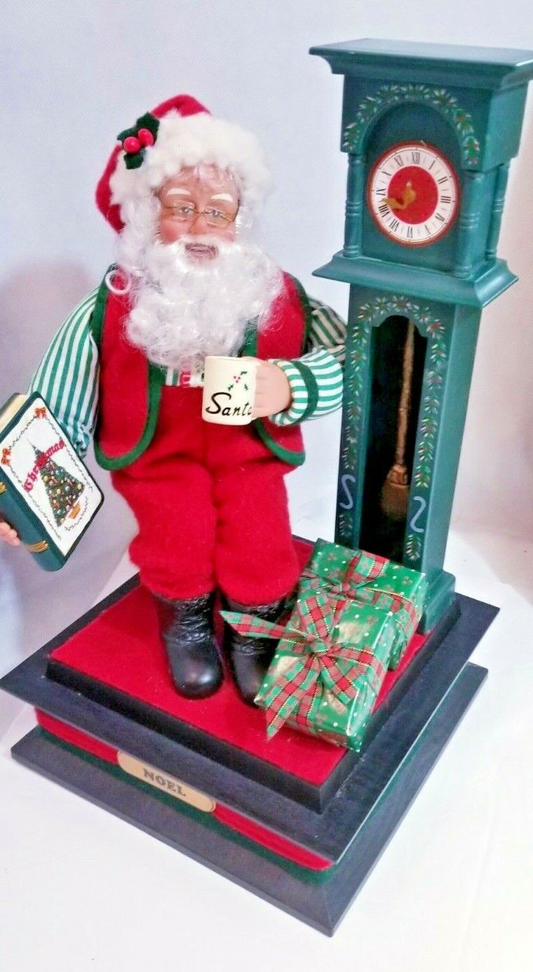 Primary image for VINTAGE CHRISTMAS LIGHTED MUSICAL SANTA 1995 Book Coffee Cup Clock Holiday Xmas