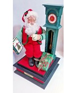 VINTAGE CHRISTMAS LIGHTED MUSICAL SANTA 1995 Book Coffee Cup Clock Holid... - €25,88 EUR