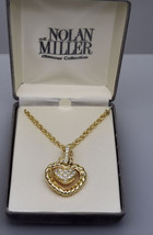 Nolan Miller&#39;s Crystal And Faux Pearl Swinging Heart Pendant - £35.84 GBP