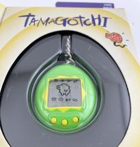 Tamagotchi Virtual Pet By Bandai Original 1996-1997 Green Yellow Egg - £91.86 GBP