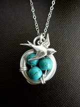 SILVER BIRD AND NEST WITH TURQUOISE EGGS PENDANT - $10.00