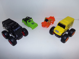Lot of Four Interchangeable MONSTER TRUCKS Toys Two Chassis and Four Tops 5x4x4 - £23.75 GBP