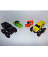 Lot of Four Interchangeable MONSTER TRUCKS Toys Two Chassis and Four Top... - $29.65