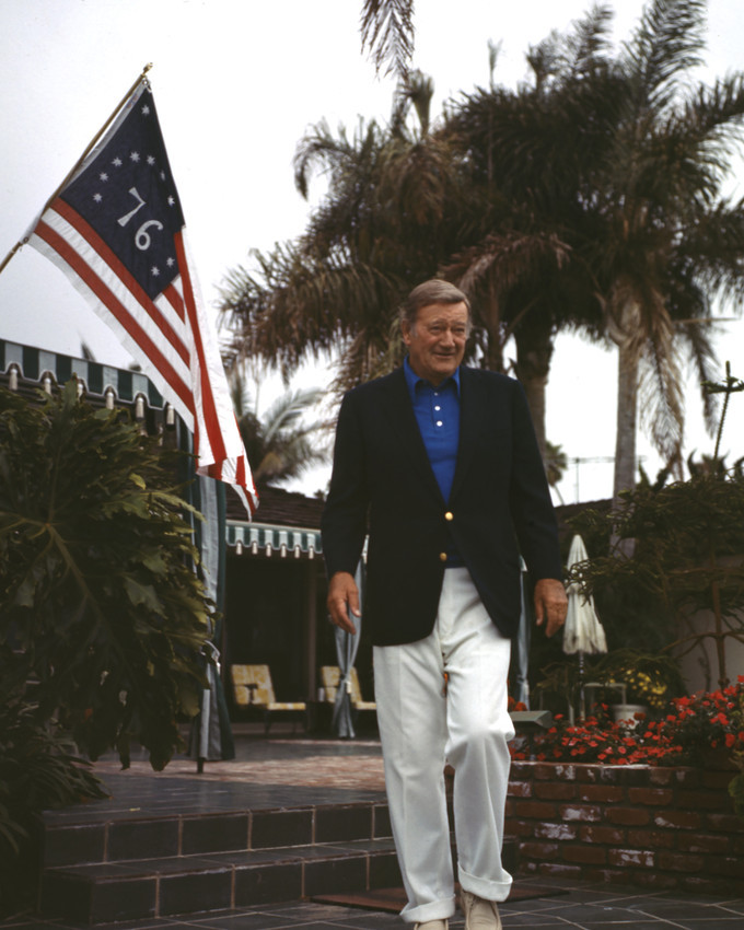 John Wayne by American flag Newport Beach home 16x20 Canvas Giclee - $69.99