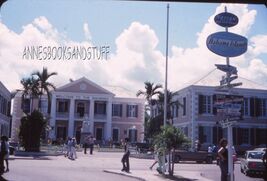 35 mm color slide * KODAK  SLIDE 1975 NASSAU BAHAMAS street scene Buildi... - $5.75