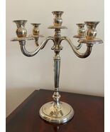 5 Flame Chandelier SILVER 800-
show original title

Original TextCandela... - $40,339.98 MXN