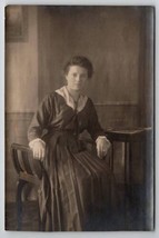 RPPC Edwardian Woman Pleated Skirt Seated for Photo Postcard F23 - £6.25 GBP