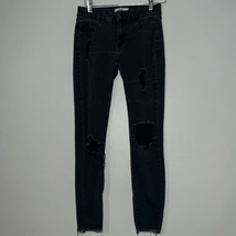 Refuge distressed/destroyed skinny jeans size 4 - $9.80