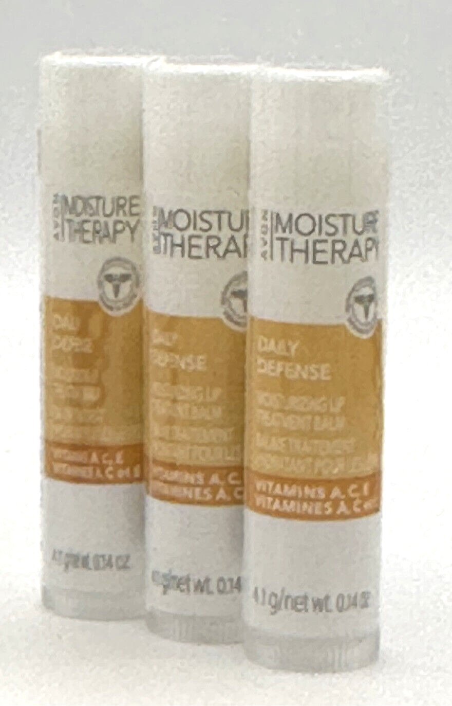 Primary image for 3 AVON Moisture Therapy Daily Defense Lip Balm W/Vitamin A,E,C SEALED!!