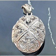 STS 925 STERLING SILVER NATURAL DIAMOND LOCKET OVAL PENDANT AT - $2,391.61 MXN