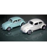 Johnny Lightning - (2) 1966 Volkswagen Beetles - $41.03 CAD