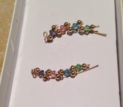 stunning pastel beaded cuff earrings - $48.99