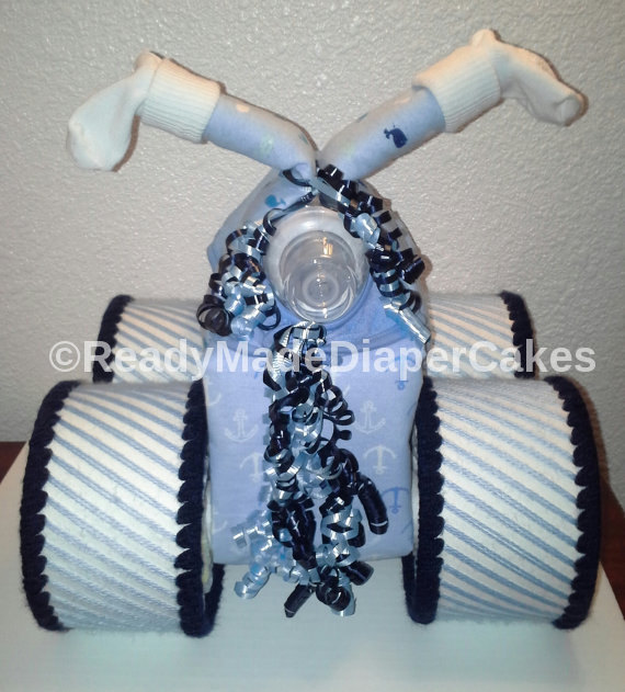 Navy Blue Light Blue and White Themed Baby Shower Four Wheeler Diaper Cake Table