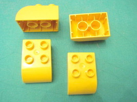 LEGO Group DUPLO 4 Yellow Bricks Curved Rare Bricks-
show original title... - $13.04