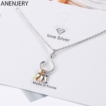 ANENJERY Silver Color Cute Three Small Fish Pendant Necklace With Fish Hook Char - £12.96 GBP