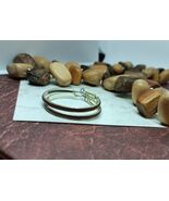 Brown Hoop Earrings  - $181.97 MXN