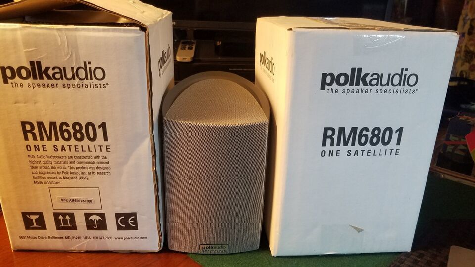 Two Polk Audio RM6801  Speakers New Condition. One still in Sealed Box.  			