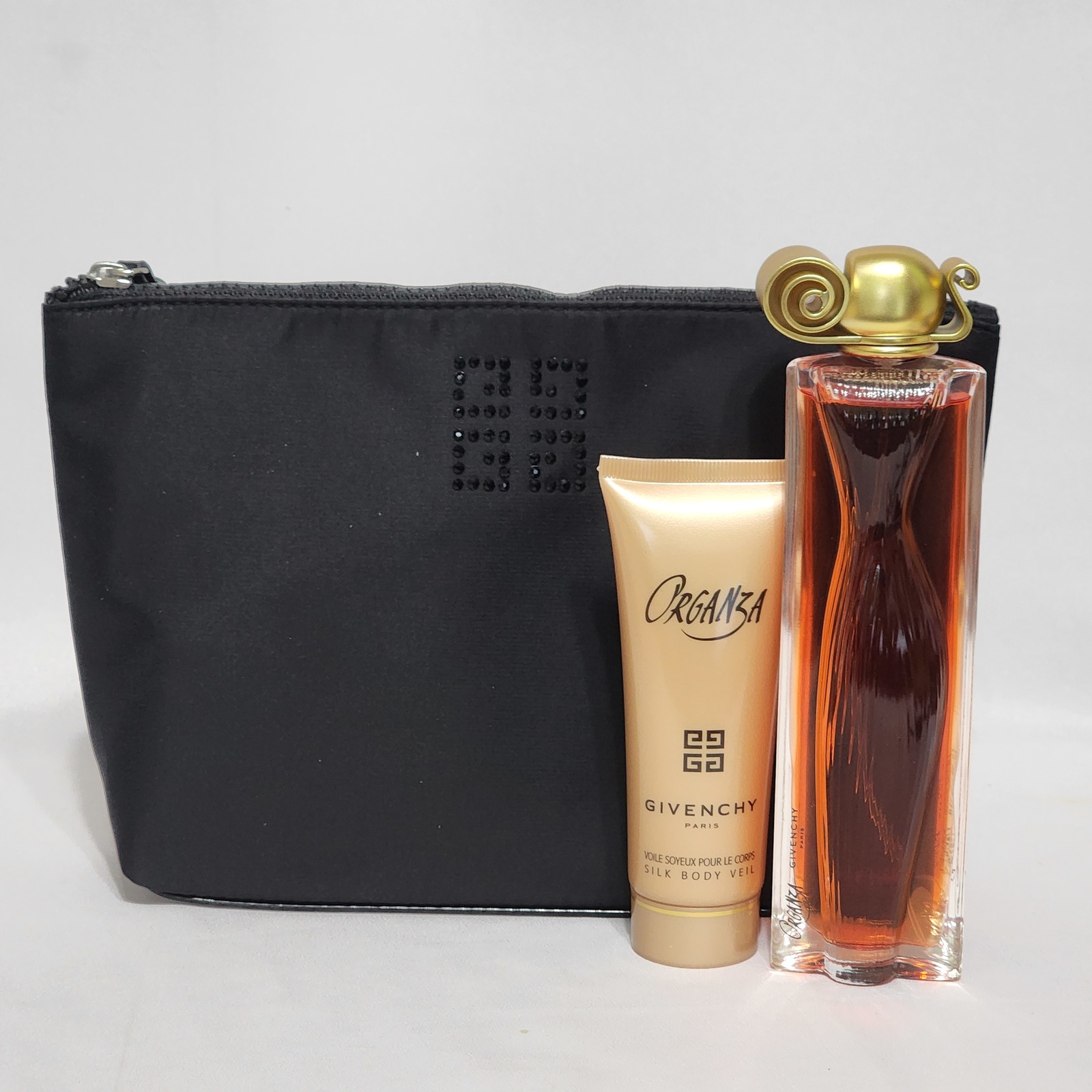 Organza by Givenchy 3PCs women set 3.3 oz EDP spray + silk body veil + pouch - $189.98