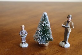 Christmas Village Figurine Caroling Man Child Boy Family Tree 2.75 Singi... - $194.78 MXN
