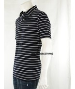 TOMMY HILFIGER  NEW WITHOUT TAG MEN&#39;S CUSTOM - SLIM FIT DARK BLUE  SIZE L - $33.78 CAD