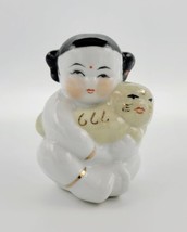 Vintage Hand Painted Chinese Porcelain Girl Holding Golden Foo Dog Figurine  - £38.87 GBP