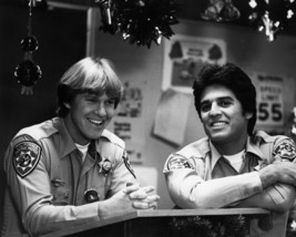 Erik Estrada and Larry Wilcox in CHiPs laughing in police station 16x20 Poster - £15.71 GBP