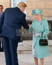 President Donald Trump And Queen Elizabeth Ii Shaking Hands 8X10 Photo - $11.32