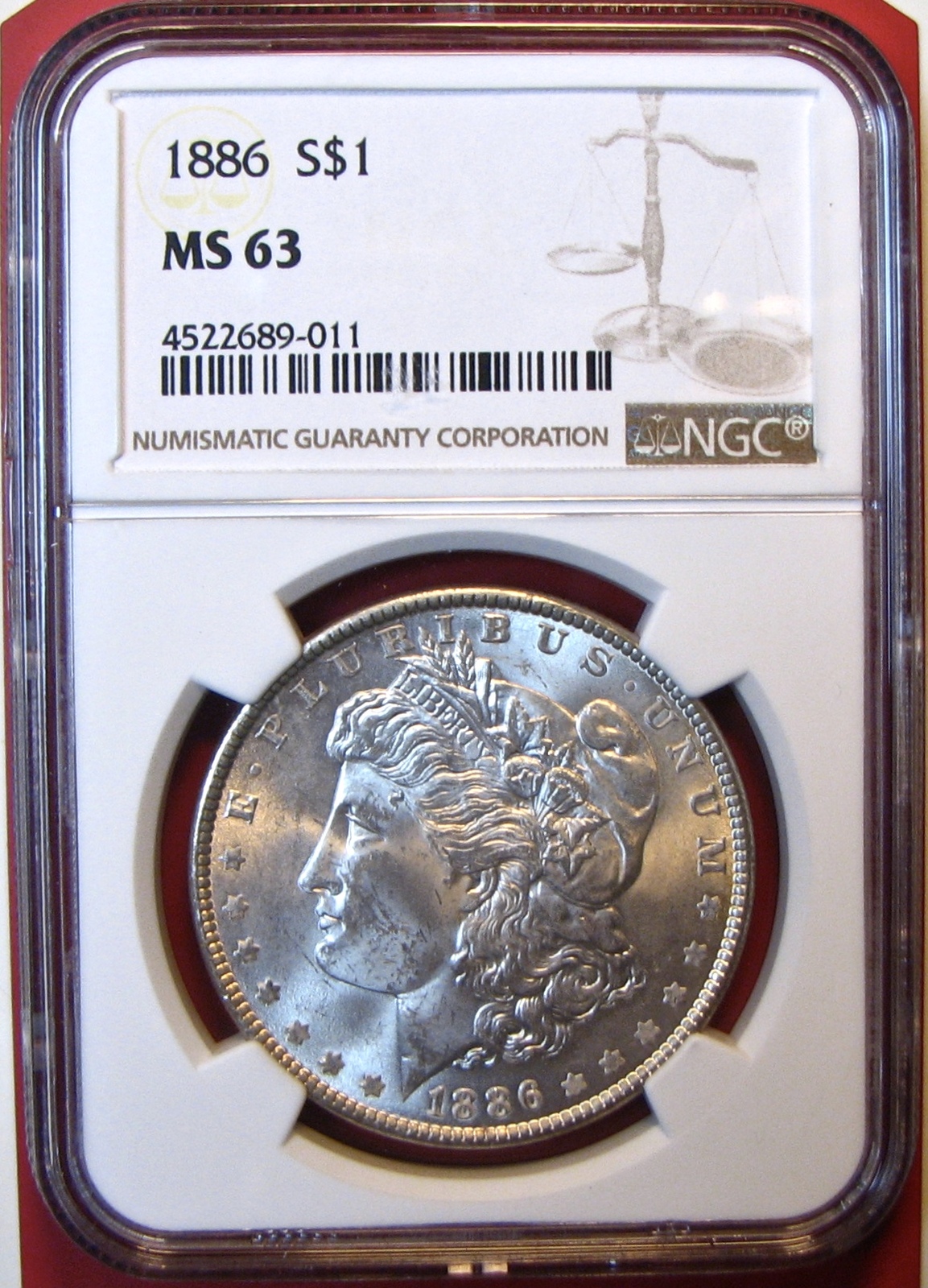 1886 NGC Morgan Silver Dollar. MS63. MG5. - $68.00