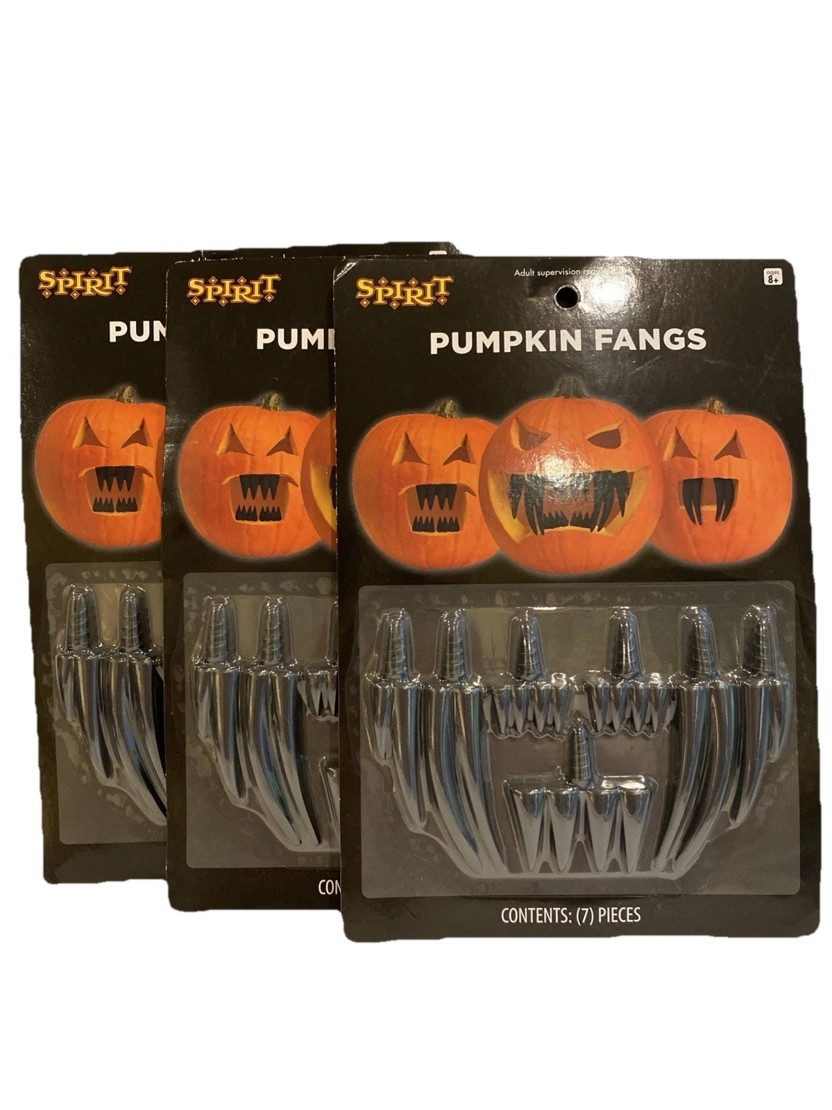 Spirit Halloween Pumpkin Fangs Lot of 3 NEW - $12.34