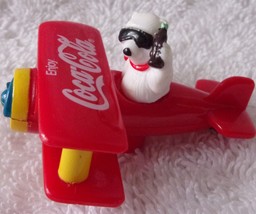 1997 Coka Cola Polar Bear In Red Plastic Plane 1997 - £3.16 GBP