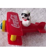 1997 Coka Cola Polar Bear In Red Plastic Plane 1997 - $5.47 CAD