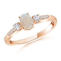 Authenticity Guarantee

ANGARA Classic Oval Opal and Diamond Three Stone Ring... - £598.64 GBP