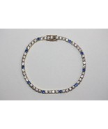 Authenticity Guarantee

14K Yellow Gold White &amp; Blue Cubic Zirconia Tenn... - $513.90