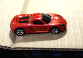 2007 Hot Wheels Porsche Carrera GT Metalflake Red HW Exotics - $9.85