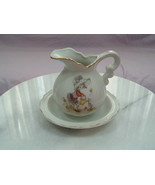 Vintage bonnet girl pitcher and saucer - $45.49