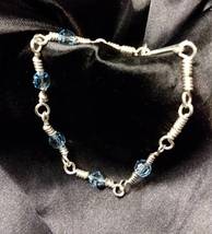 Bracelet - hand woven links with fine, blue crystal beads - £23.92 GBP