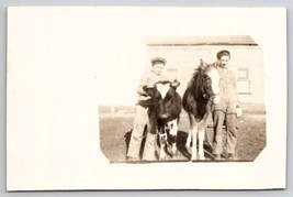 RPPC Two Young Farm Boys With Cow And Pony Masked Photo Postcard T27 - £5.46 GBP