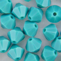 4mm Turquoise Swarovski Xilion Crystal Beads 5328, 72 opaque blue bicone - $7.00