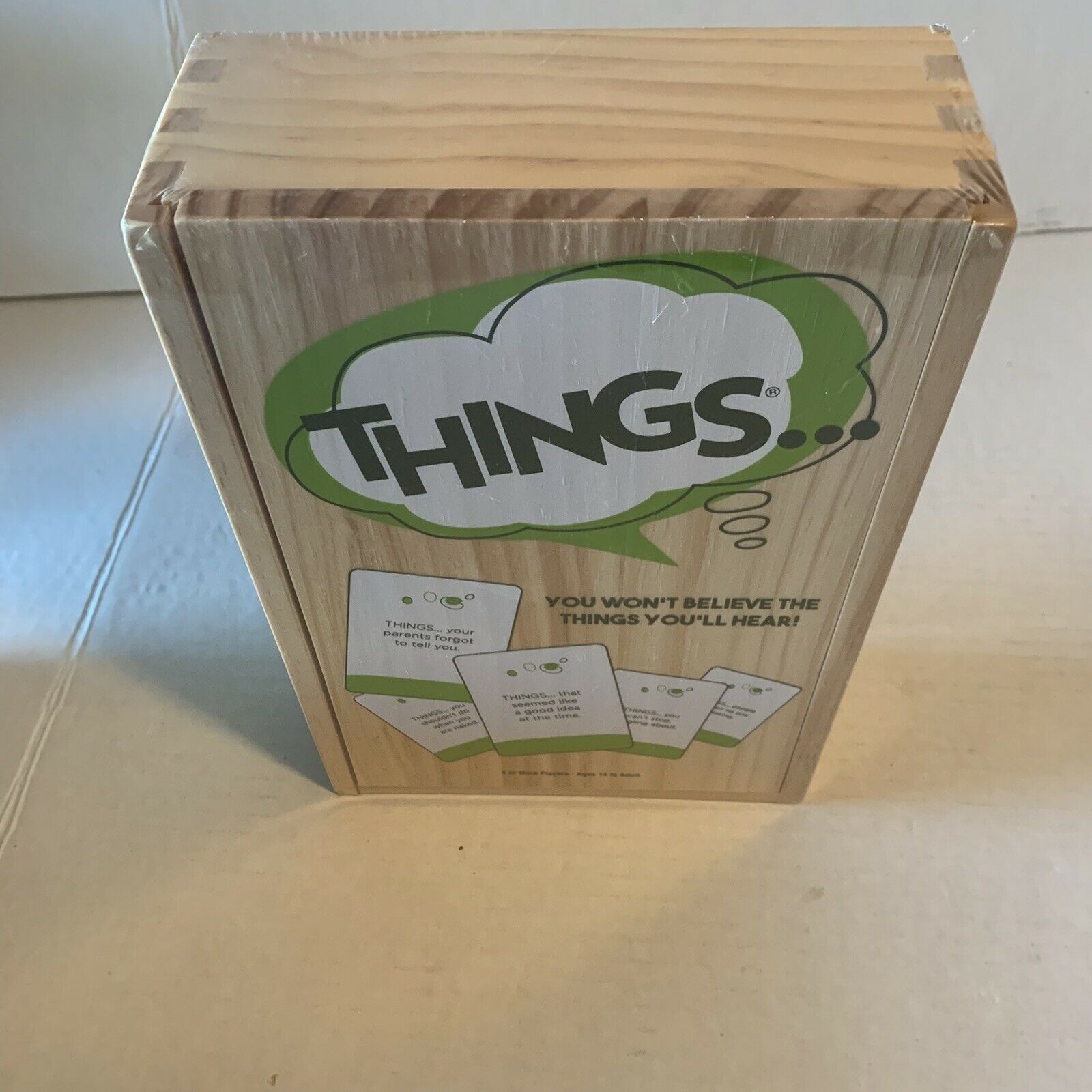 Primary image for Things You Won't Believe the Things You'll Hear Game Wooden Box