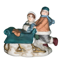 Christmas Village Ornament People On Sled Made in Taiwan - £11.63 GBP