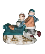 Christmas Village Ornament People On Sled Made in Taiwan - $277.08 MXN