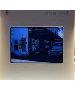 35mm Slide Photo US Navy Sailor Reading Newspaper In Front Of Liquor Sto... - $653.98 MXN
